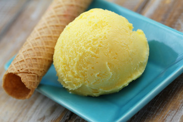 Mango sorbet with wafer