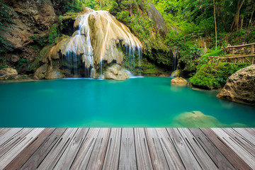 wonderful waterfall in thailand  with wooden floor