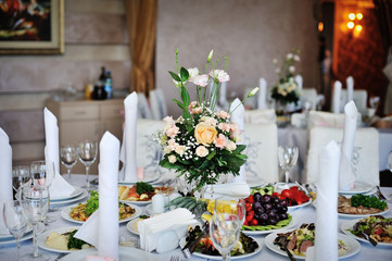 table decorated with flowers wedding dinner