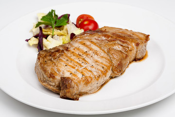A great beef steak with vegetables