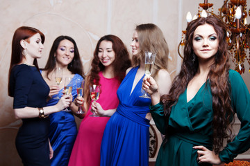 Portrait of cheerful girl with champagne
