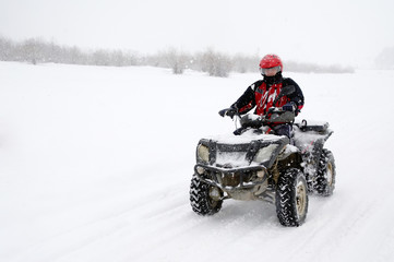 All-terrain vehicle in the snow © Rechitan Sorin