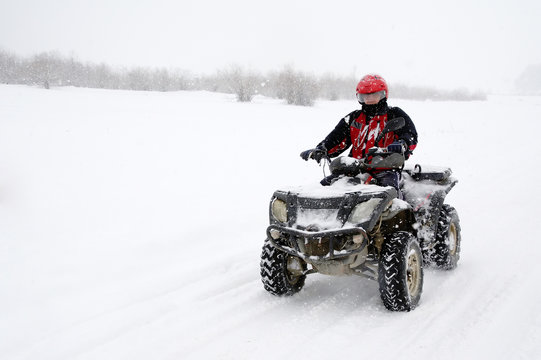 All-terrain vehicle in the snow
