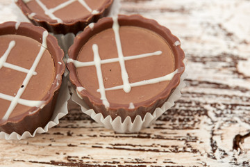 Dark chocolate on wooden background