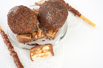 Cupcake with chocolate on white