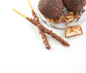 Cupcake with chocolate on white