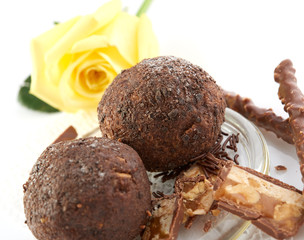 Cupcake with chocolate on white