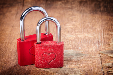 red locks with hearts on grunge old background
