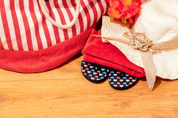 Summer accessories on wooden surface