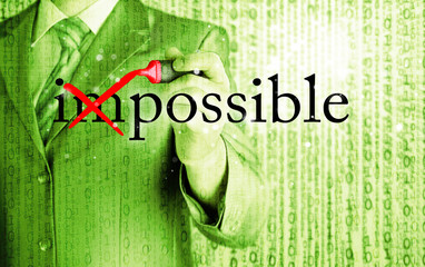 Businessman Hand turning the word Impossible into Possible with
