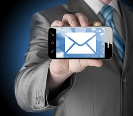 A man holding smartphone with one new message on a screen