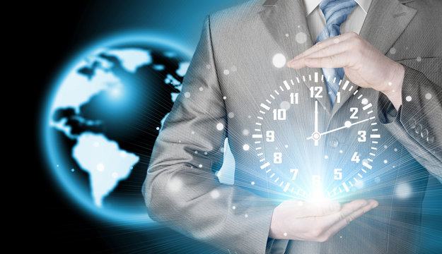 Image of businessman holding clock against illustration