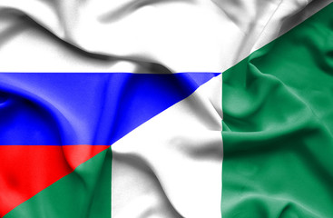 Waving flag of Nigeria and Russia
