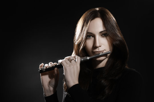 Flute piccolo flutist playing