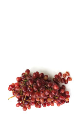 Red grapes on a white background.
