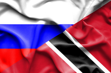 Waving flag of Trinidad and Tobago and Russia