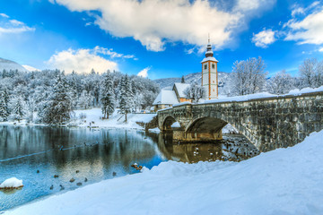 Church of St. John the Baptist by the Bohinj lake at winter