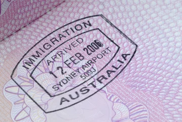 Fototapeten Immigration stamp Australia on a passport page photo © david_franklin