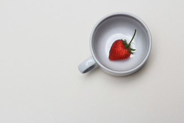 strawberry in cup