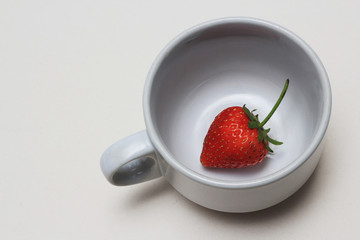 strawberry in cup