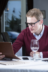 businessman checking the bill.