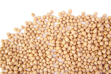 Uncooked chickpeas on white background.