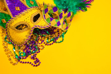 Mardi Gras Mask on yellow Background