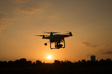 Silhouette Drone / quadcopter during sunrise or sunset