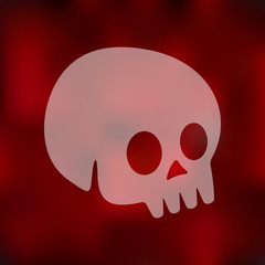 skull icon on blurred background