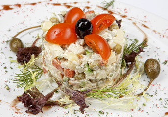 Russian traditional salad olivier with pea