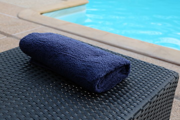 Fototapeta na wymiar Towel at the swimming pool