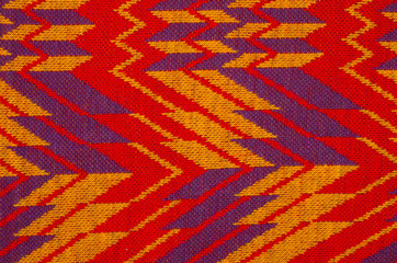Knit woolen texture.Red retro woven thread as a background.