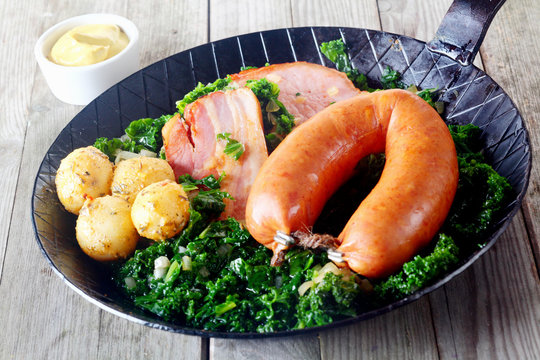 Cooked Potatoes, Kassler and Sausage on Kale