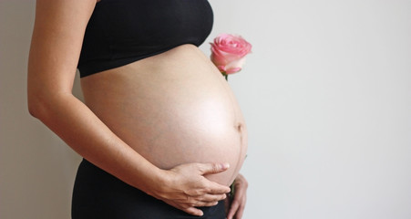 Asian woman pregnant belly