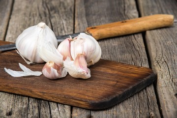Garlic on wooden background