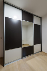 Wooden wardrobe with mirrors