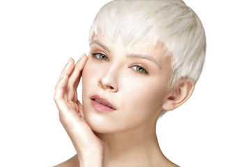 Beauty model blonde short hair showing perfect skin