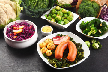 German Cooked Food with Fresh Veggies on Sides