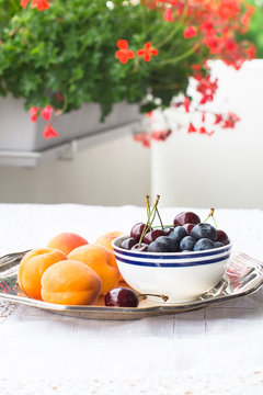 Apricots and a Cup of Fresh Blueberries and Cherries