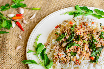 Rice topped with stir-fried pork and basil