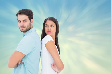 Fototapeta premium Composite image of unhappy couple not speaking to each other