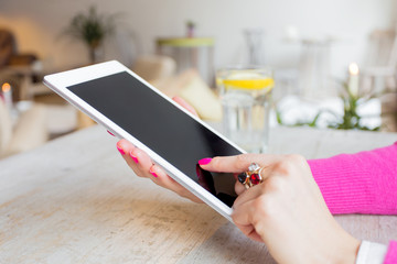 Woman using tablet computer