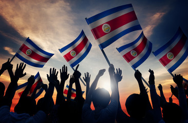 Silhouettes People Holding Flag Costa Rica Concept