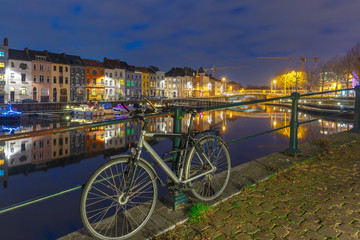 Embankment of the river Leie in Ghent town at night, Belgium
