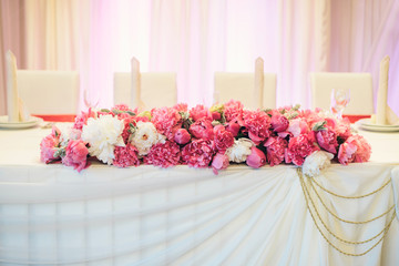 floral arrangement of peonies on the table