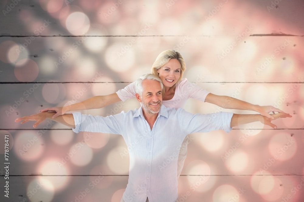 Aufkleber composite image of smiling couple posing with arms out