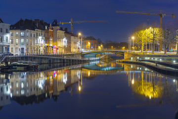 Fototapeta na wymiar Embankment of the river Leie in Ghent town at night, Belgium
