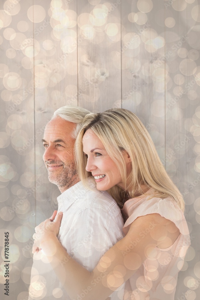 Aufkleber composite image of affectionate couple standing and hugging