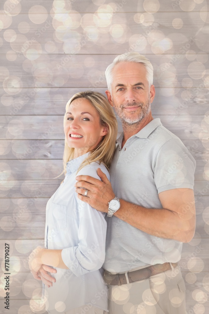 Poster composite image of happy couple smiling at camera