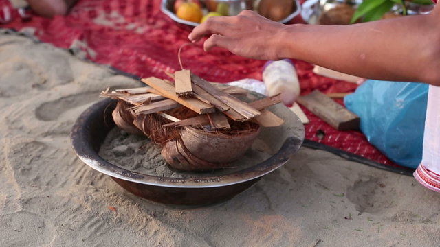hindu brahmin makes ritual fire at the Indian wedding ceremony o
